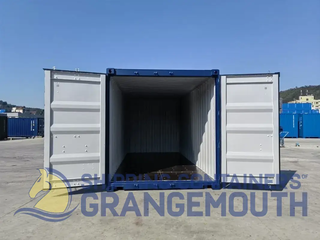 An open shipping container with a blue exterior, set against a clear sky and other containers in the background.